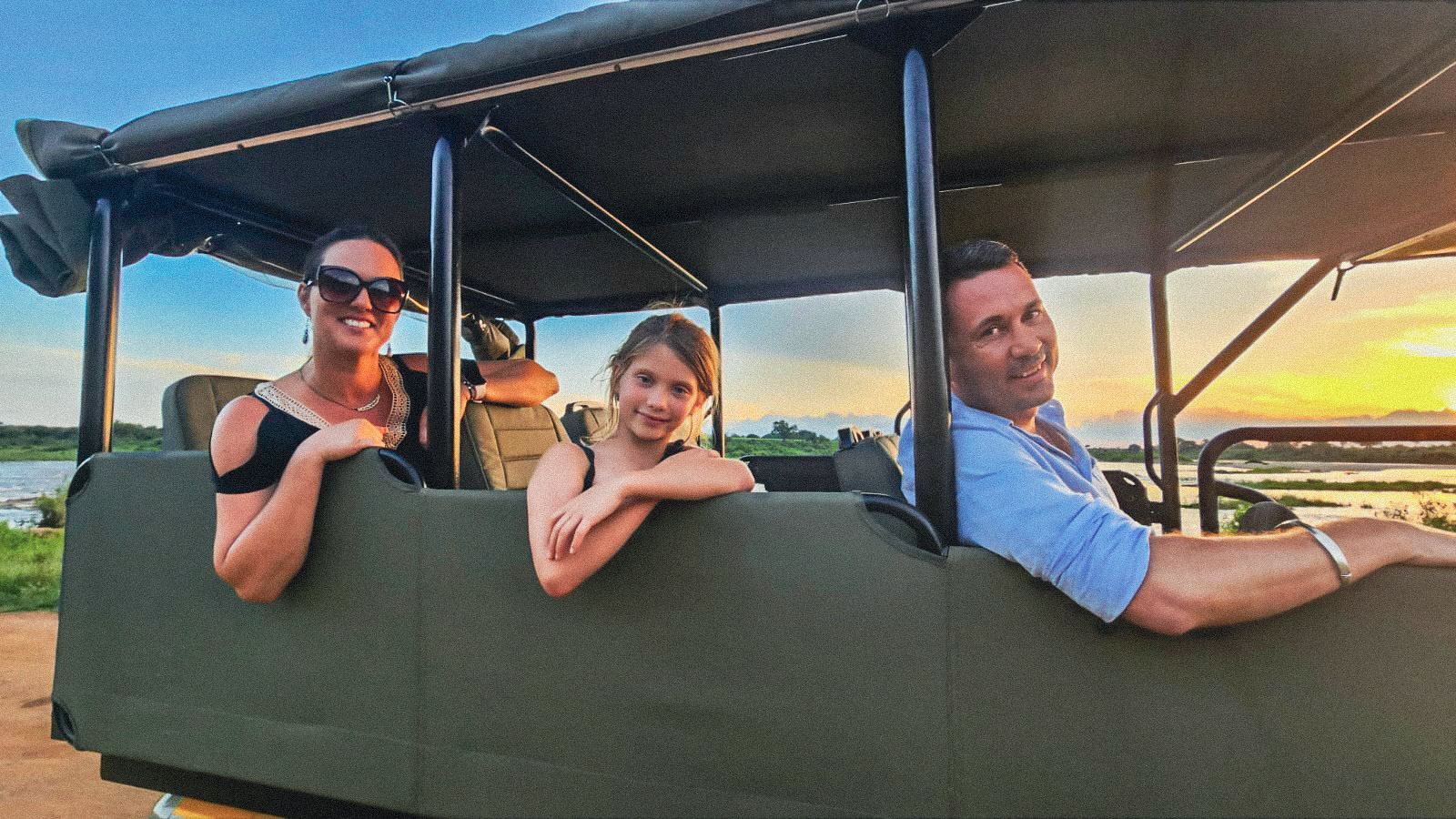 Travis, Melissa and Mia on a sunset game drive